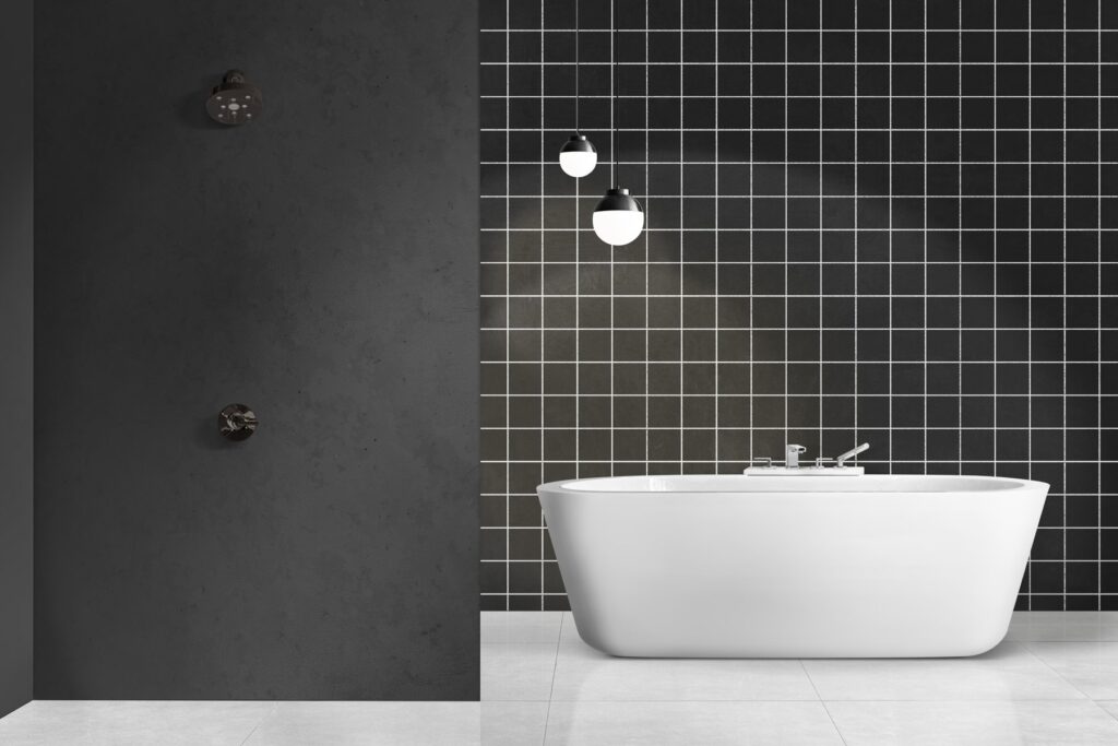 Renovering af badeværelse i Glostrup med mørke fliser og moderne badekar