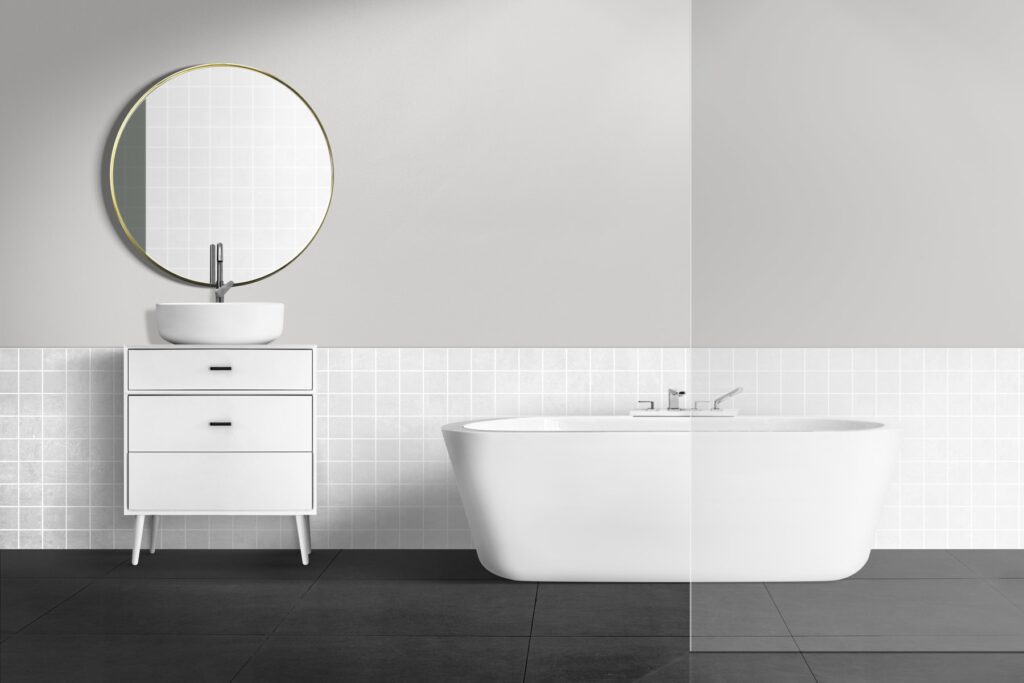 Renovering af badeværelse på Østerbro med lyse fliser og stilrent vaskemøbel